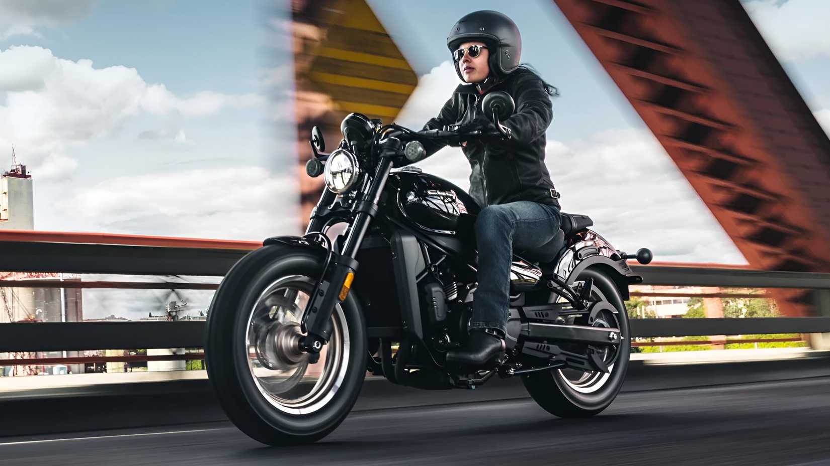 2026 CFMoto 450CL-C in black accelerating front third quarter view