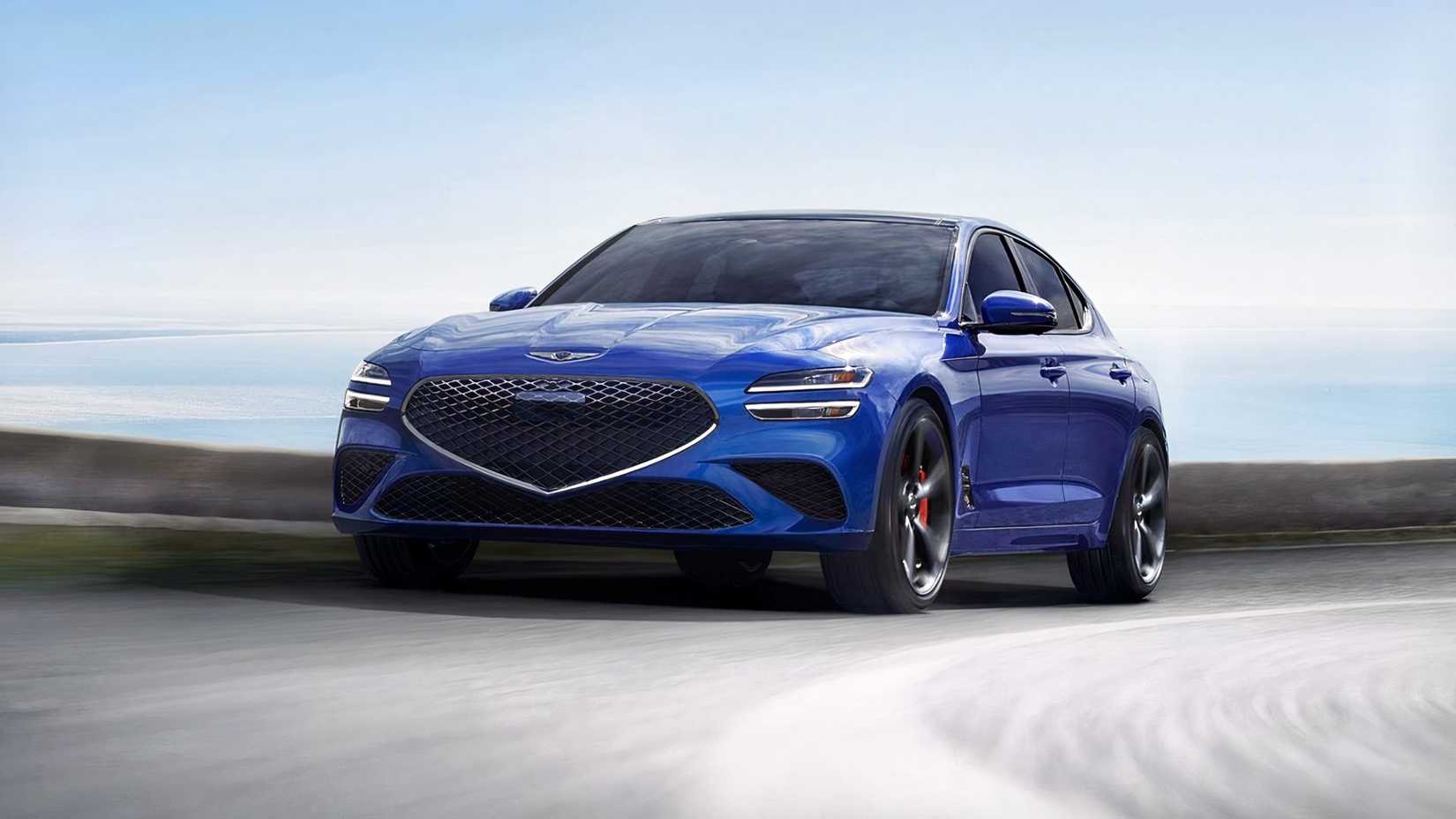 2026 Genesis G70 vista frontal 3/4 dirigindo na estrada
