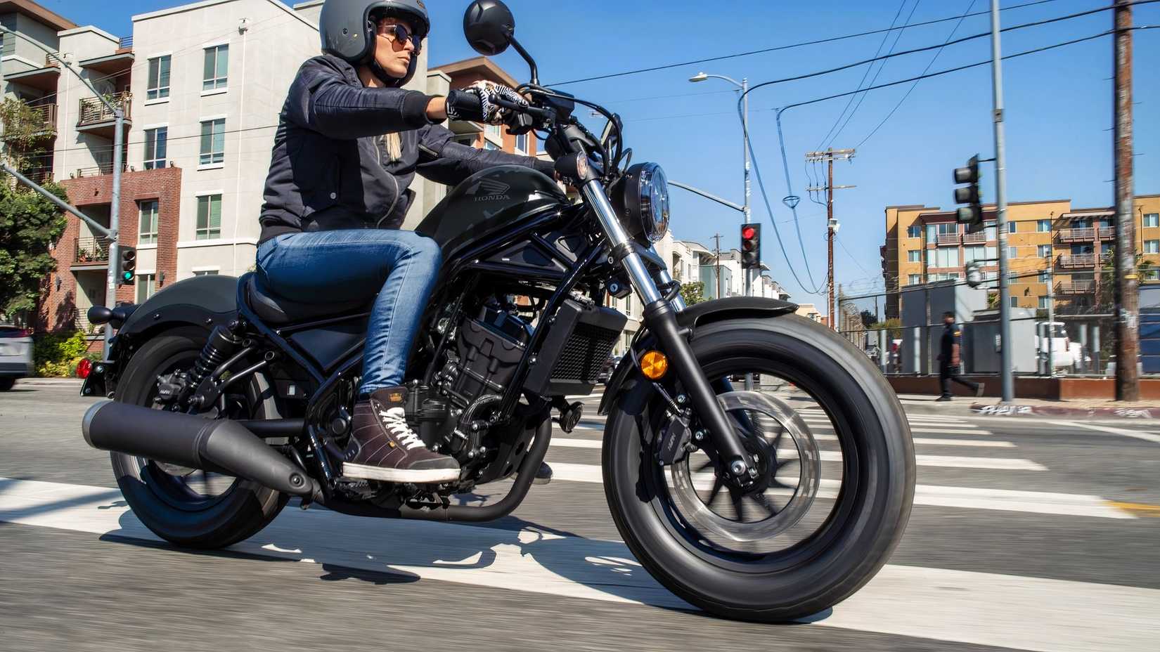 2026 Honda Rebel 300 E-Clutch action riding shot closeup