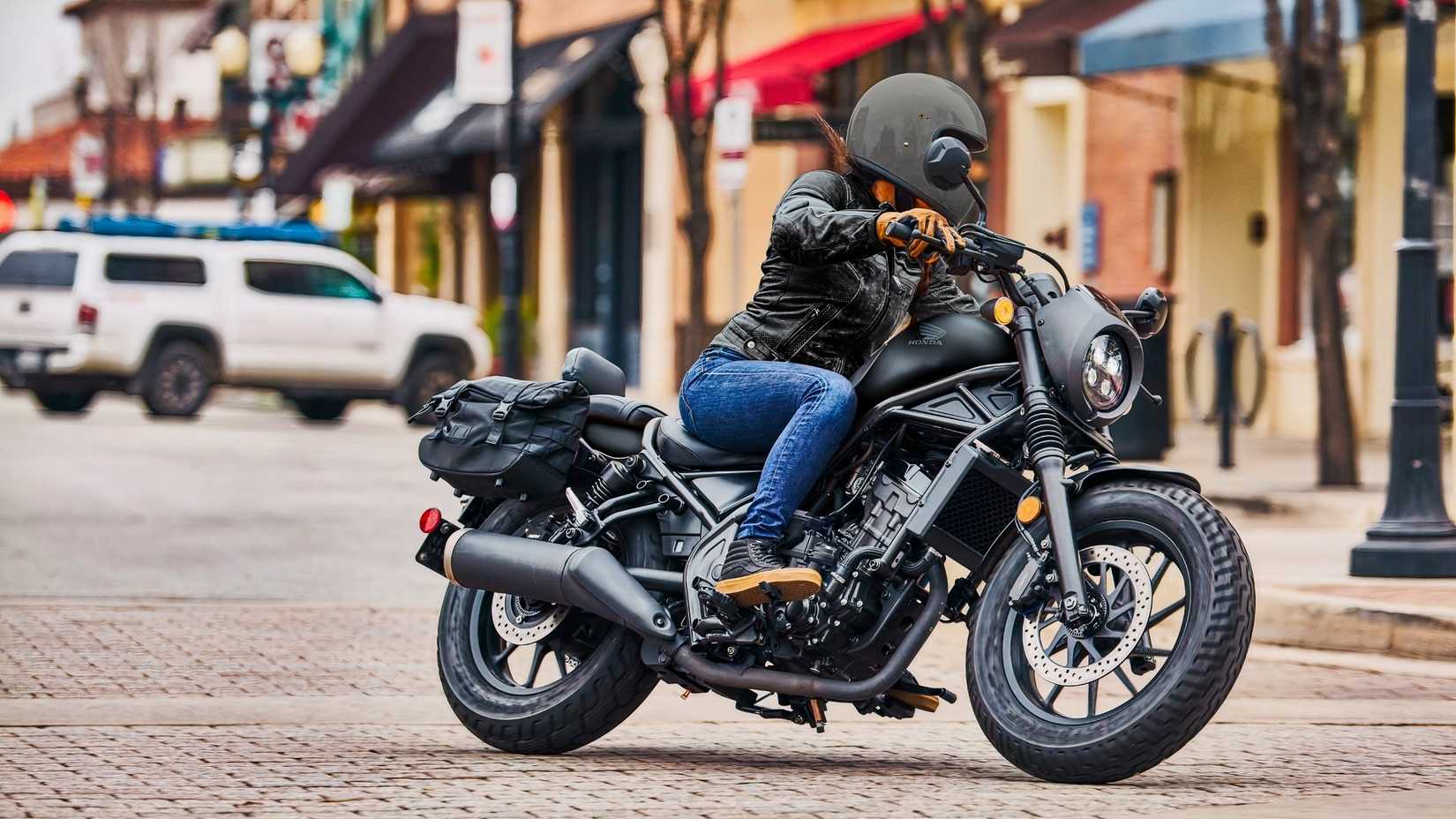 2026 Honda Rebel 300 E-Clutch side view cornering shot