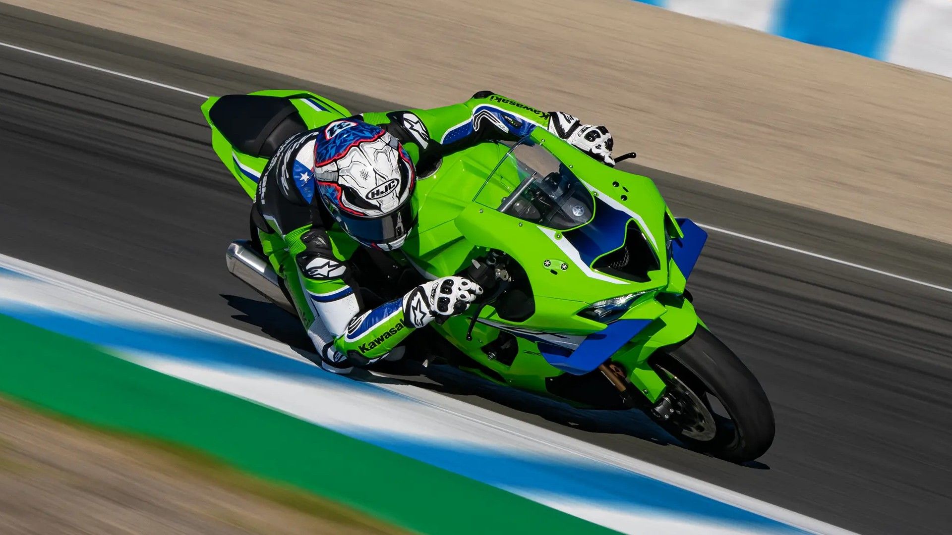 Rider cornering hard with a 2026 Kawasaki Ninja ZX-10R on the race track