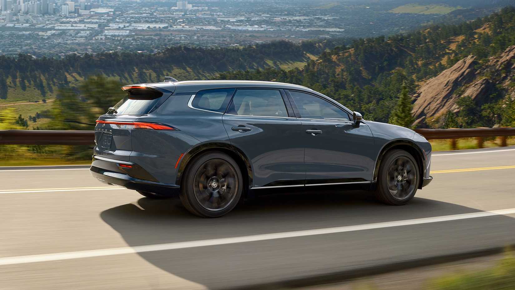 2026 Toyota Crown Signia accelerating rear third quarter view