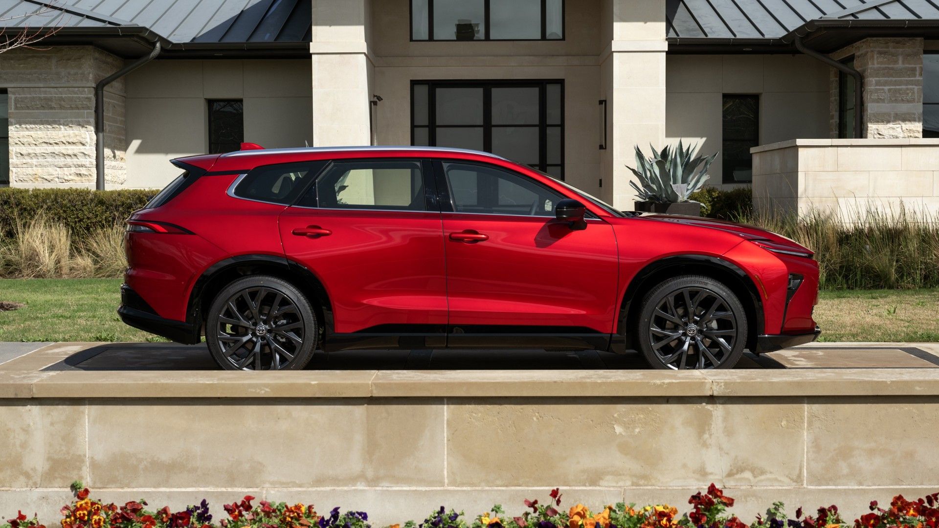 2026 Toyota Crown Signia in red side profile view