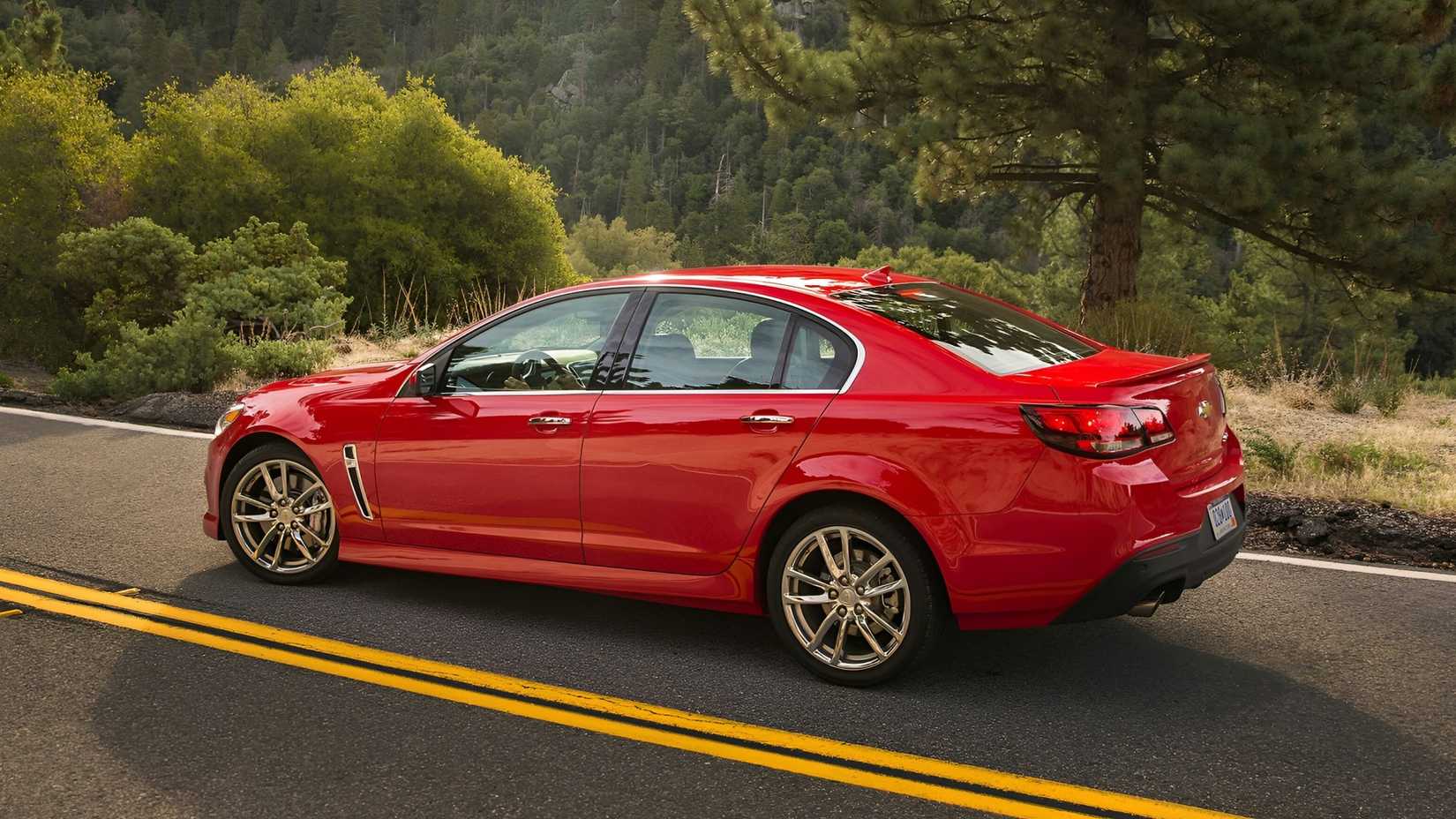 2014 Chevrolet SS in red rear third quarter view parked in road