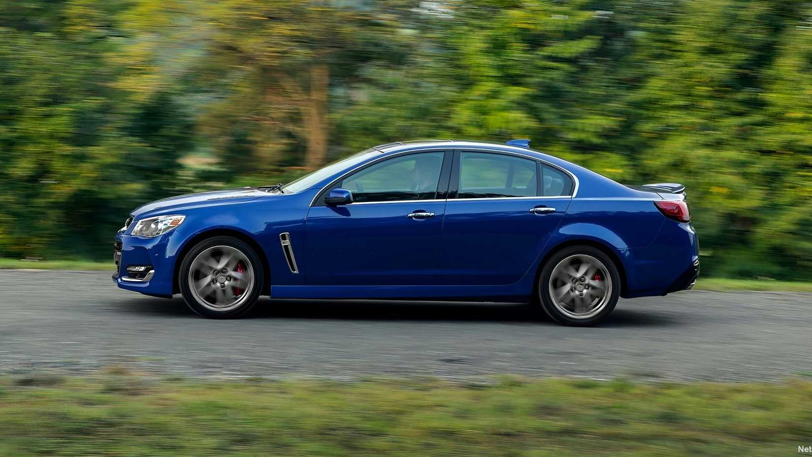 2016 Chevrolet SS accelerating in a straight line side profile view