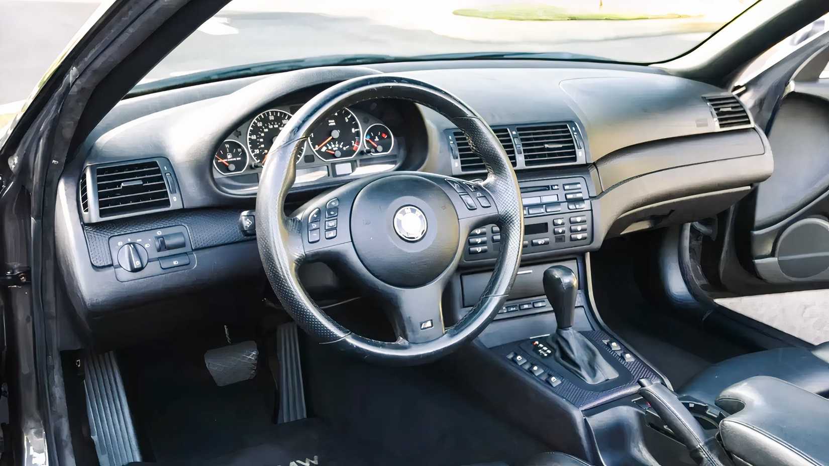 2005 BMW 330 interior 1/2