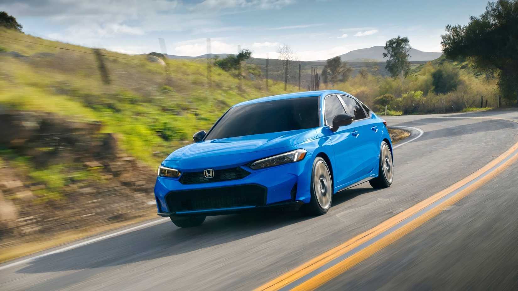 Honda Civic Hatchback front 3/4 driving view