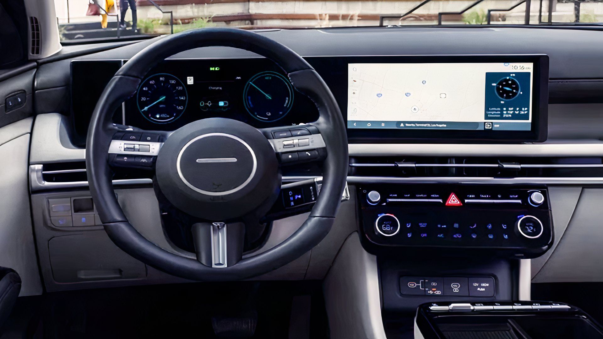 Foto do interior do Hyundai Tucson Hybrid 2026 mostrando o painel