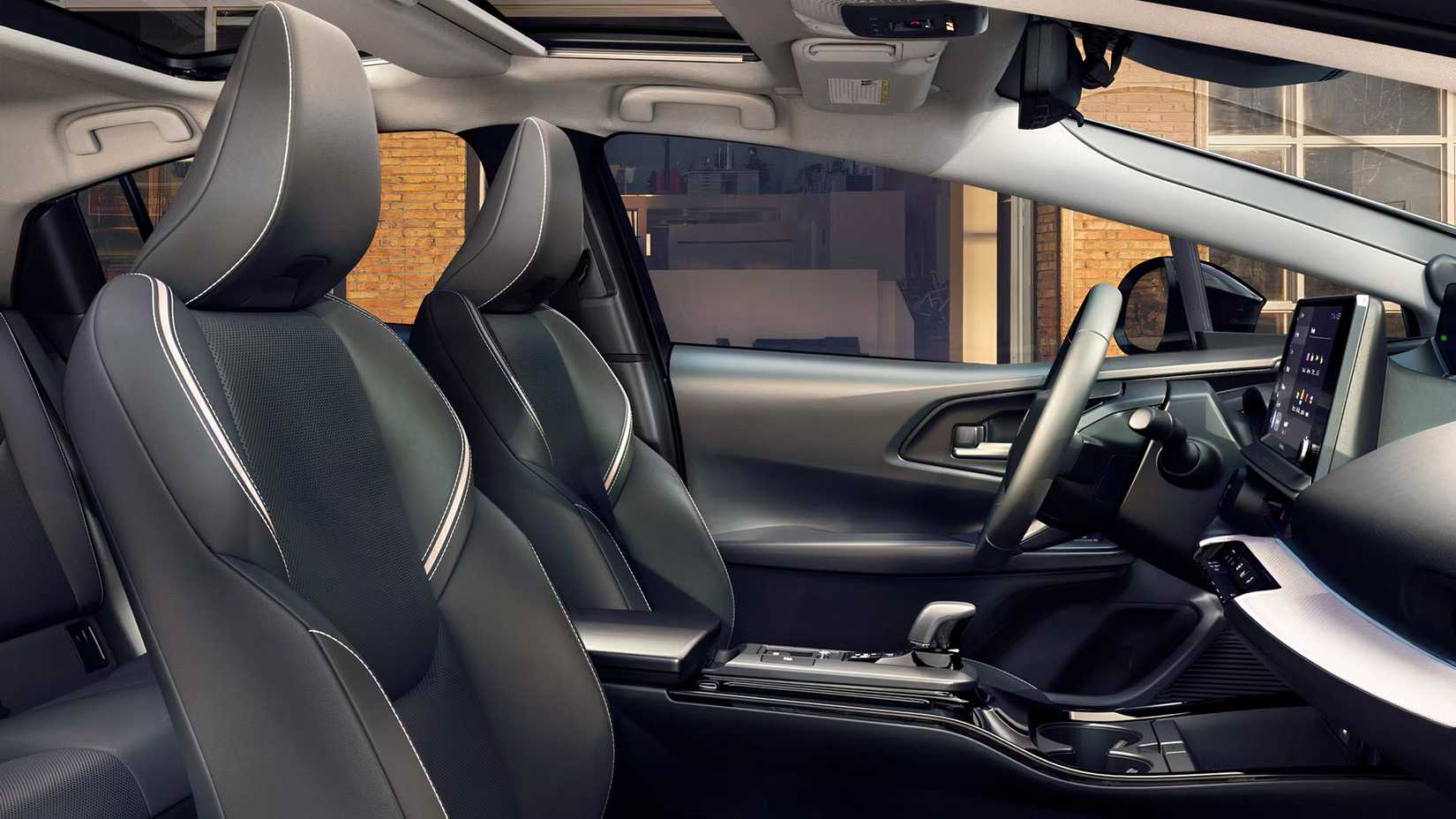 Interior do Toyota Prius 2026 mostrando cabine dianteira