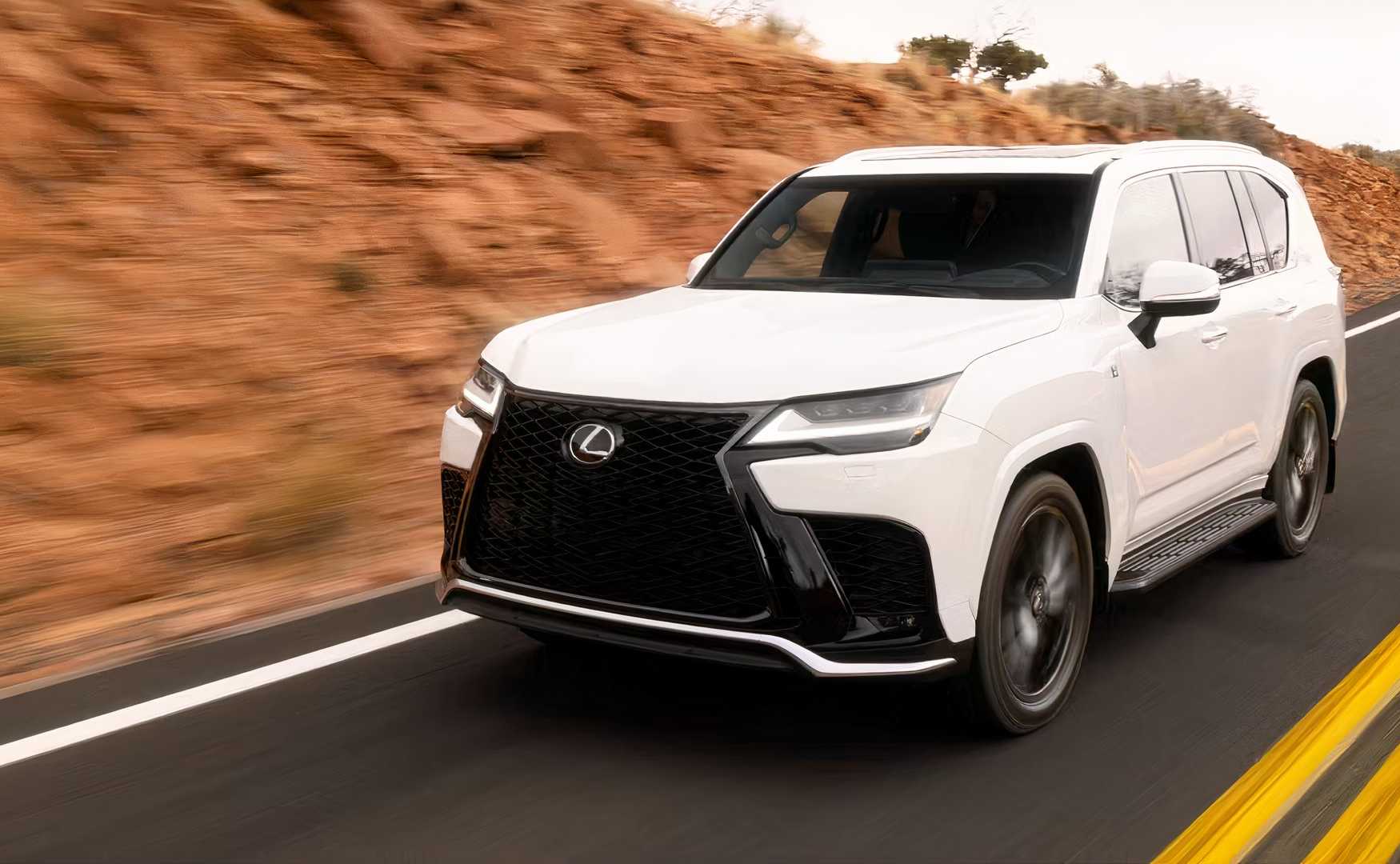 2026 Lexus LX front 3/4 shot driving on the road