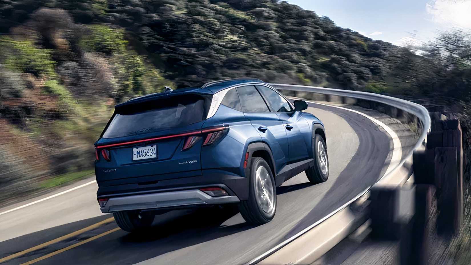 2026 Hyundai Tucson Hybrid rear 3/4 action