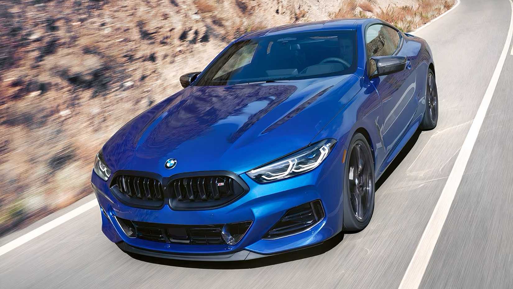 2026 BMW M 8 Series Coupe front 3/4 action