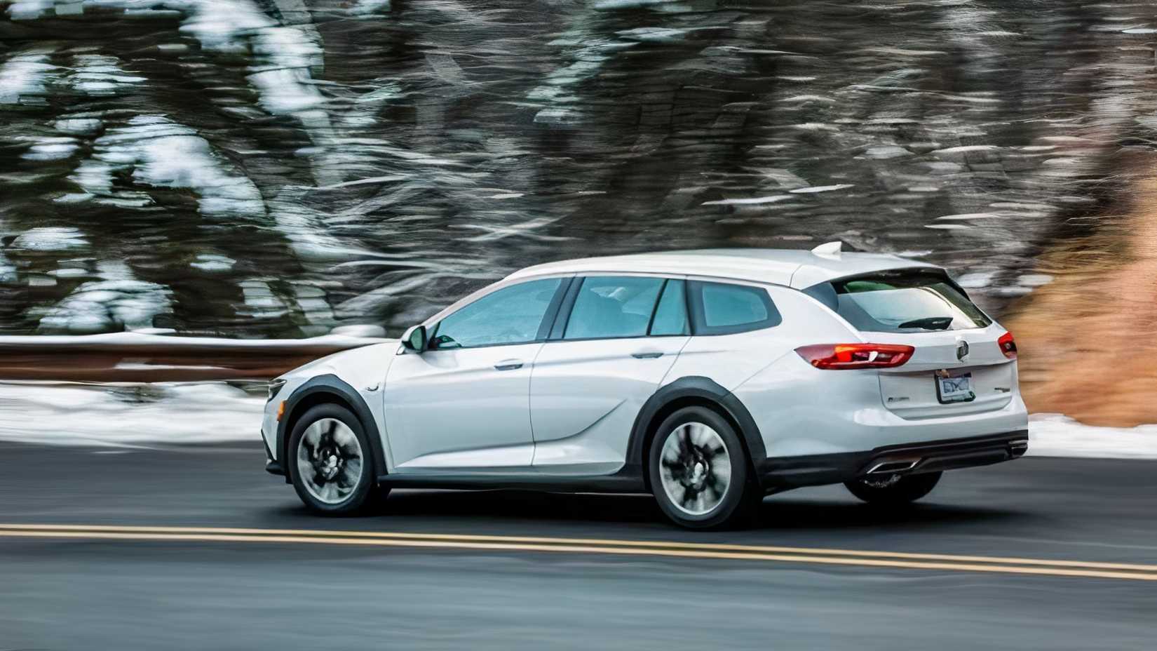 Side shot of a 2019 Buick Regal TourX driving in winter environment