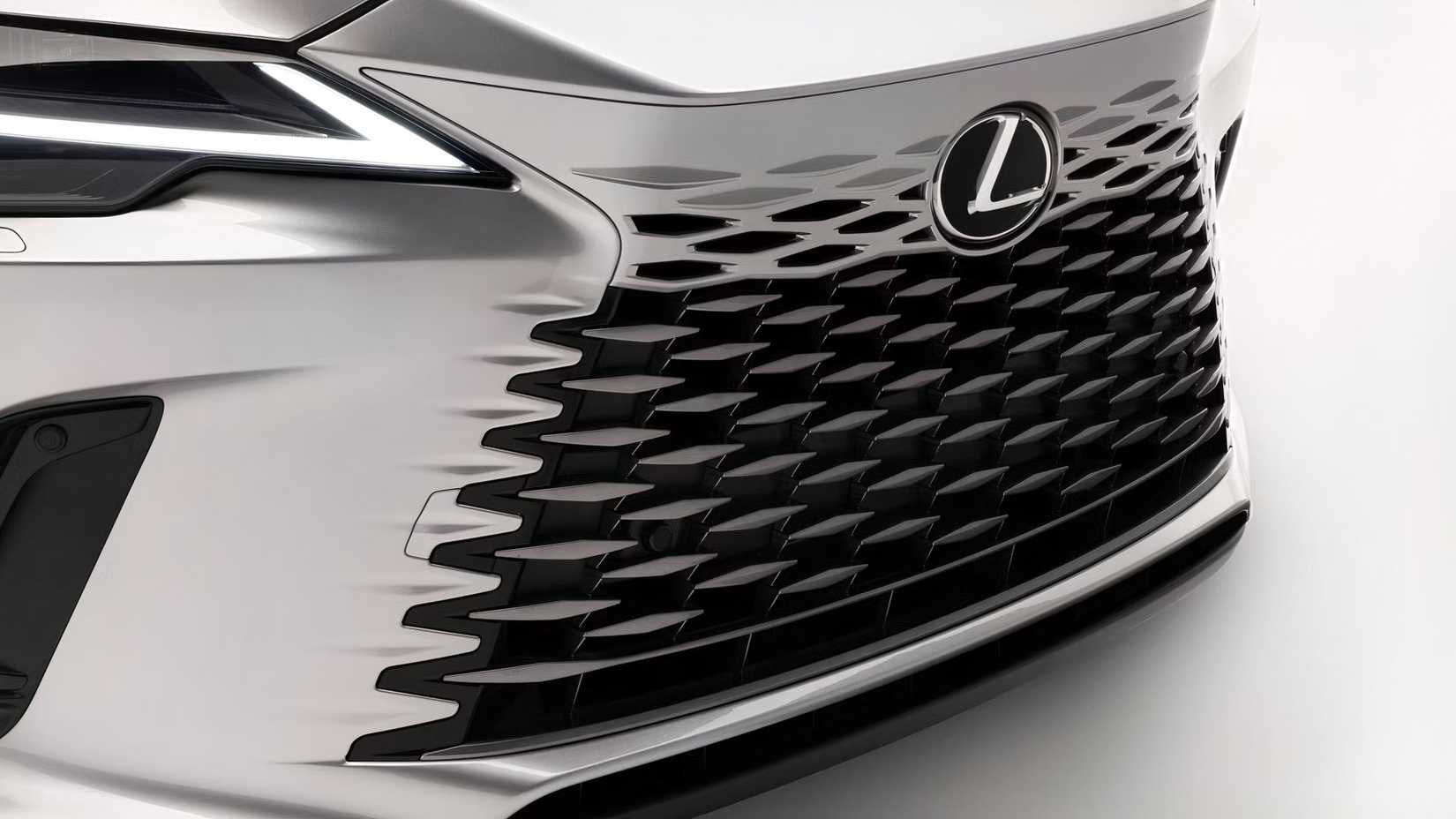 A close-up shot of the grille on the face of a 2026 Lexus RX