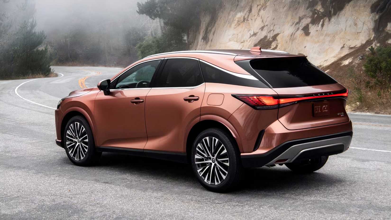 Copper-Colored 2026 Lexus RX rear 3/4 parked on road