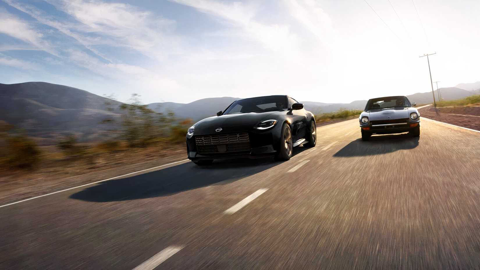 A 2026 Nissan Z and Datsun 240Z driving on an open road