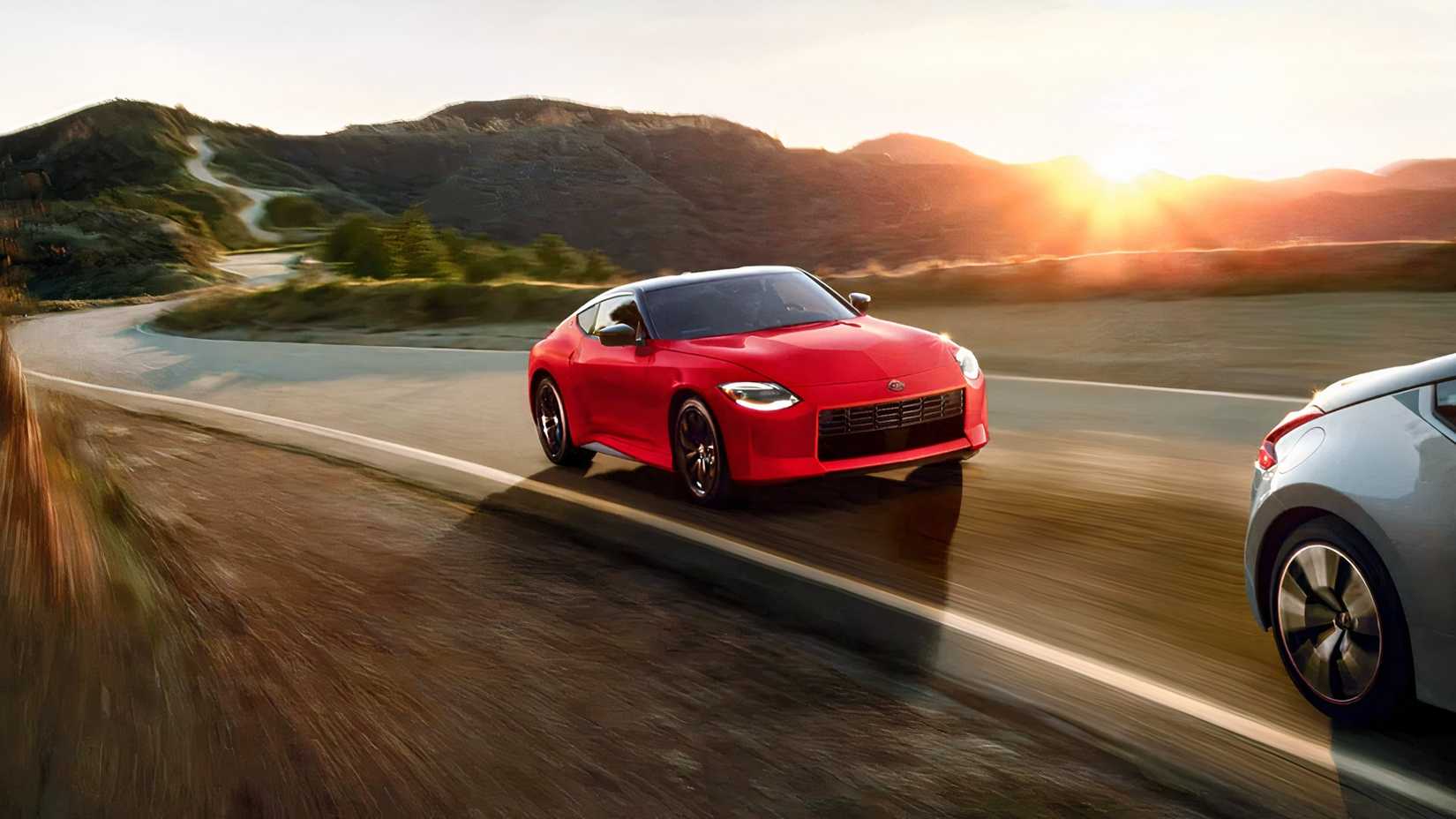 A 2026 Nissan Z driving on a windy road