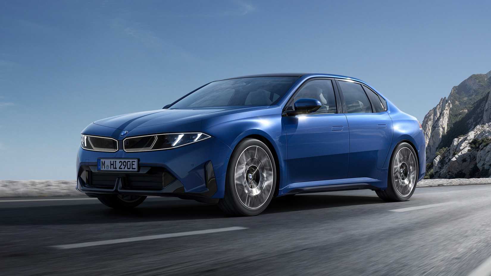 Front 3/4 driving photo of a blue 2027 BMW i3 50 xDrive