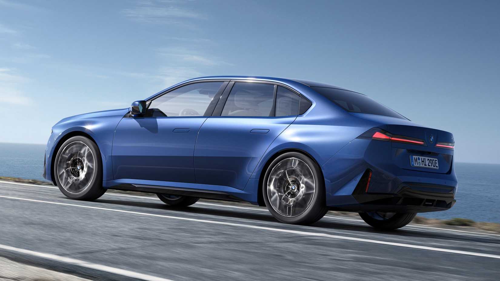 Foto traseira 3/4 de direção de um BMW i3 50 xDrive 2027 azul
