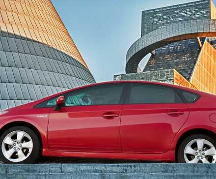 2012 Toyota Prius in red side view