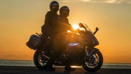 2026 Suzuki GSX-S1000GT+ with pillion and luggage cinematic shot