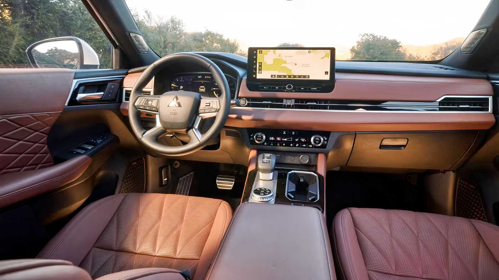 Interior do Mitsubishi Outlander 2026 mostrando cabine dianteira