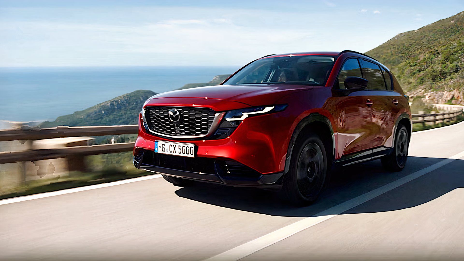 Foto frontal de ação 3/4 do Mazda CX-5 2026