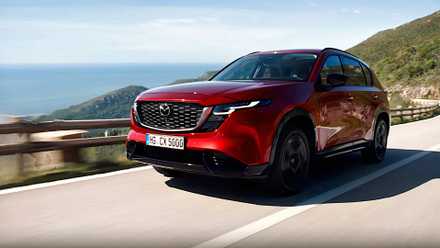 Front 3/4 action shot of 2026 Mazda CX-5