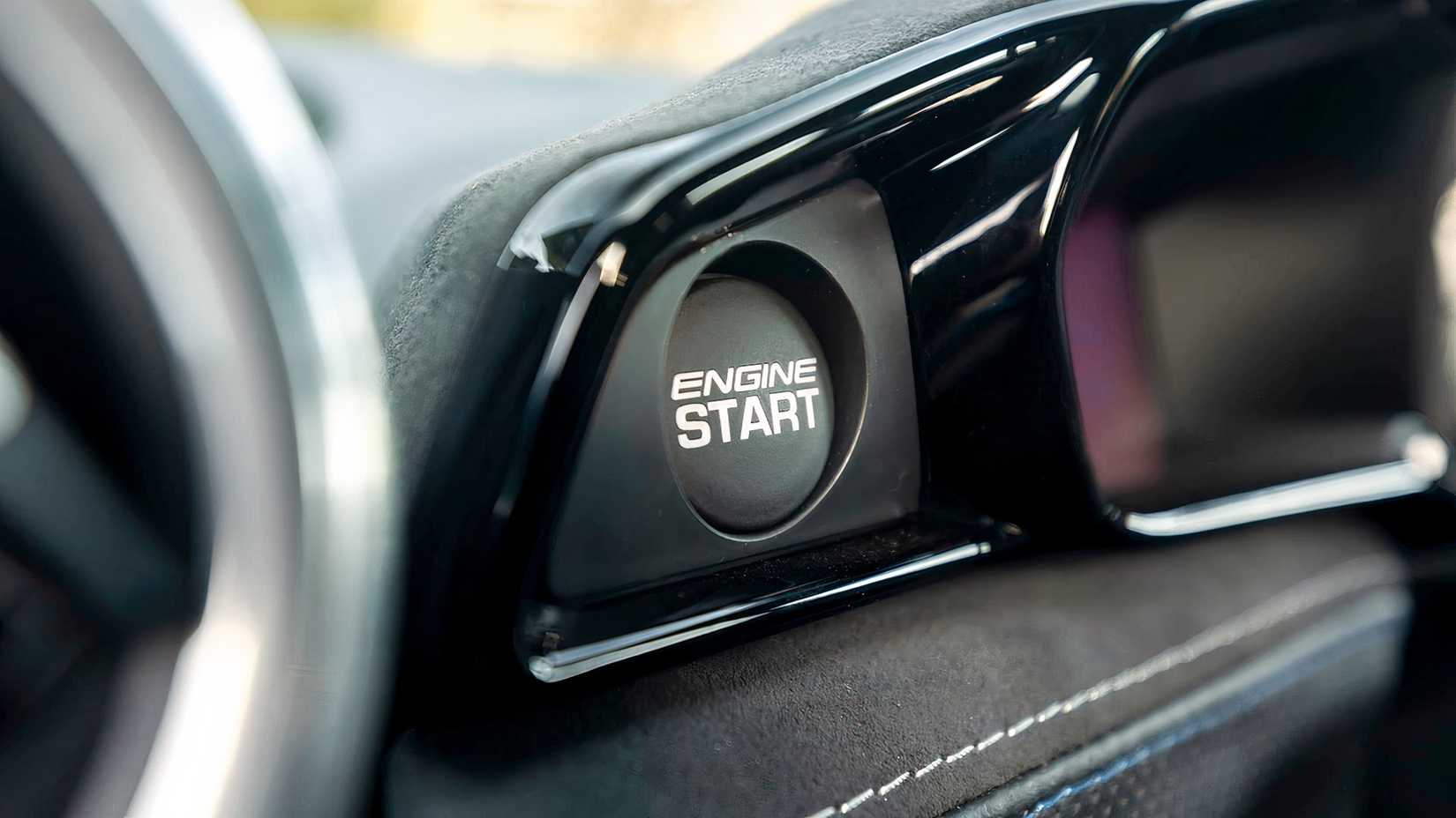 Lotus Evora GT engine start button closeup