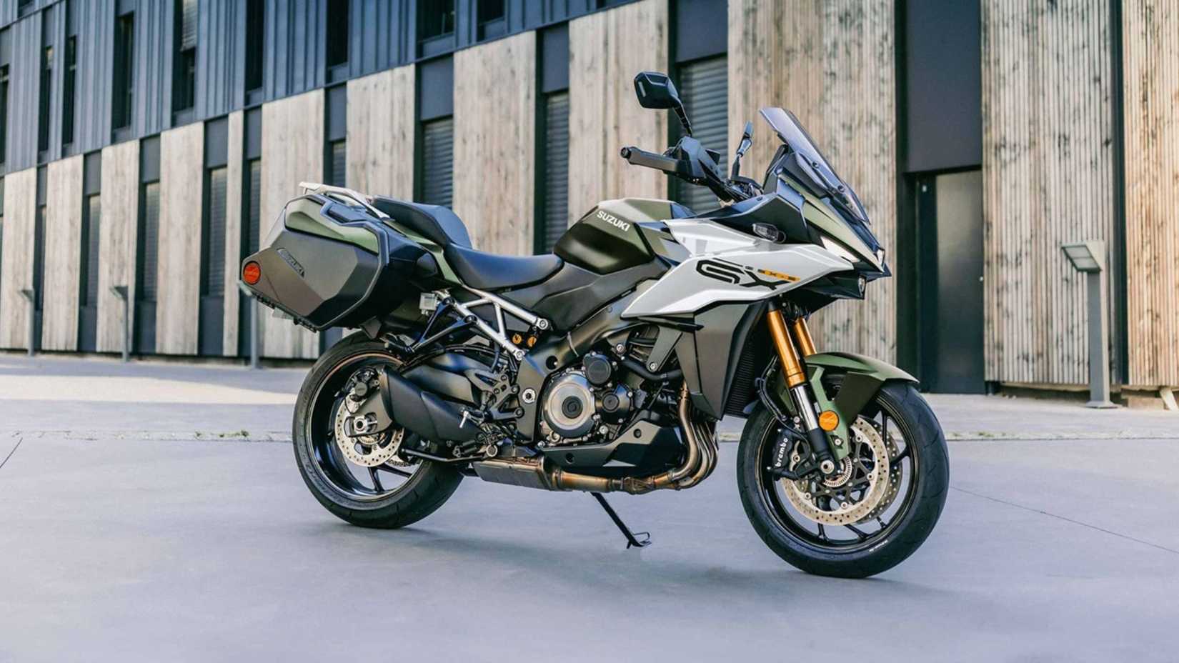 Static shot of a Suzuki GSX-S1000GX+ against a warehouse backdrop