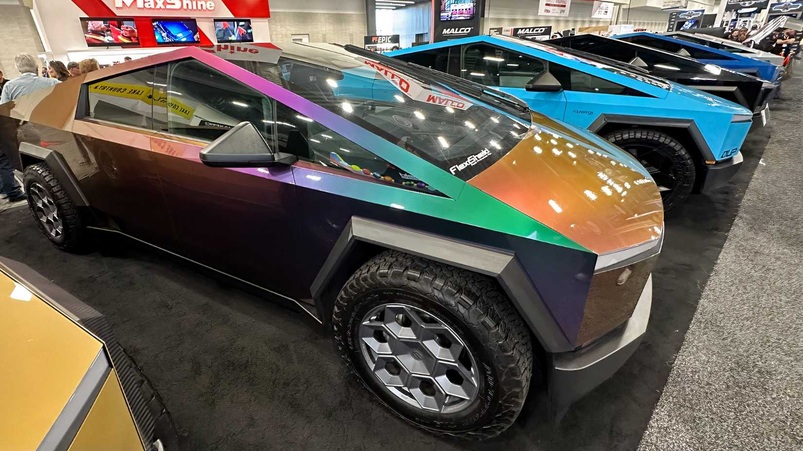 A Passenger's Side VIew Of A Tesla Cybertruck With Custom Wrap 