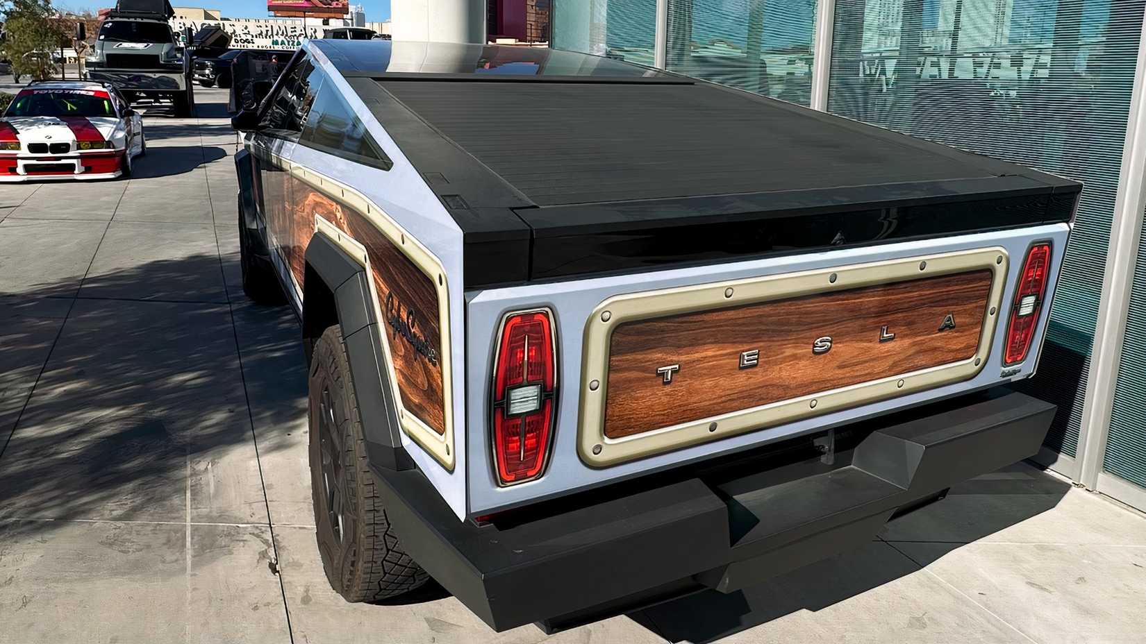 A Rear View Of A Tesla Cybertruck With Custom Panel Wrap