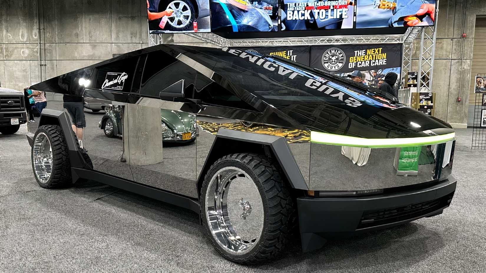 A Passenger's Side View of A Tesla Cybertruck Customized Mirror Finish By Chemical Brothers
