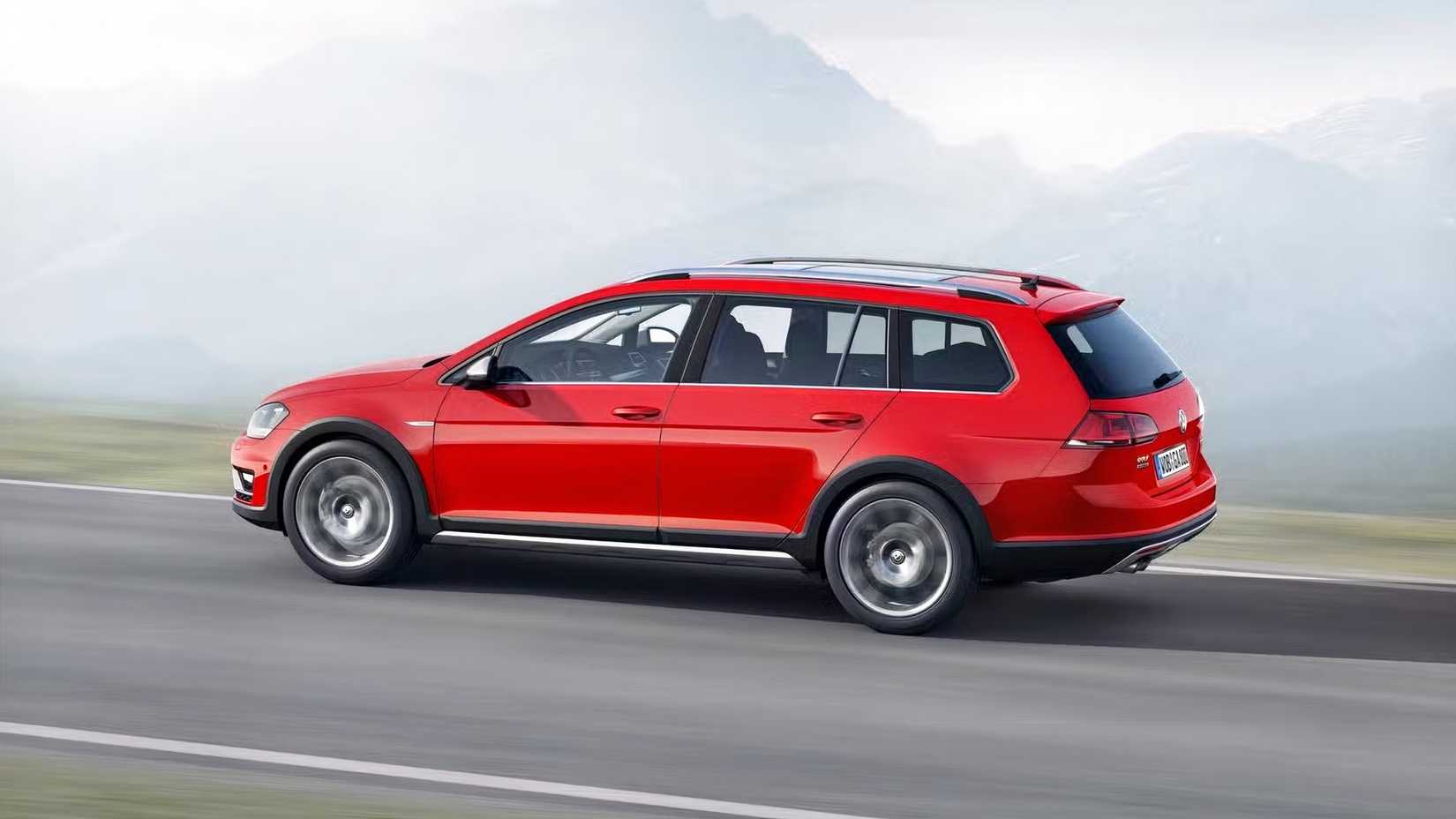 Side shot of a red 2015 Volkswagen Golf Alltrack driving