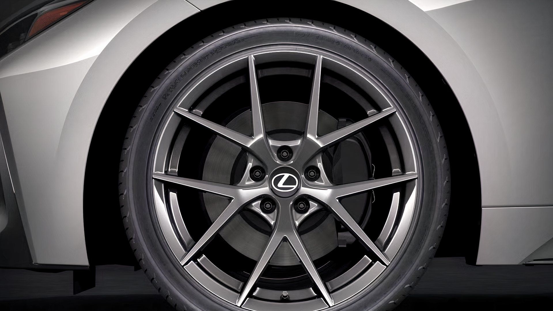 Close-up shot of a gray 2026 Lexus IS's front wheel