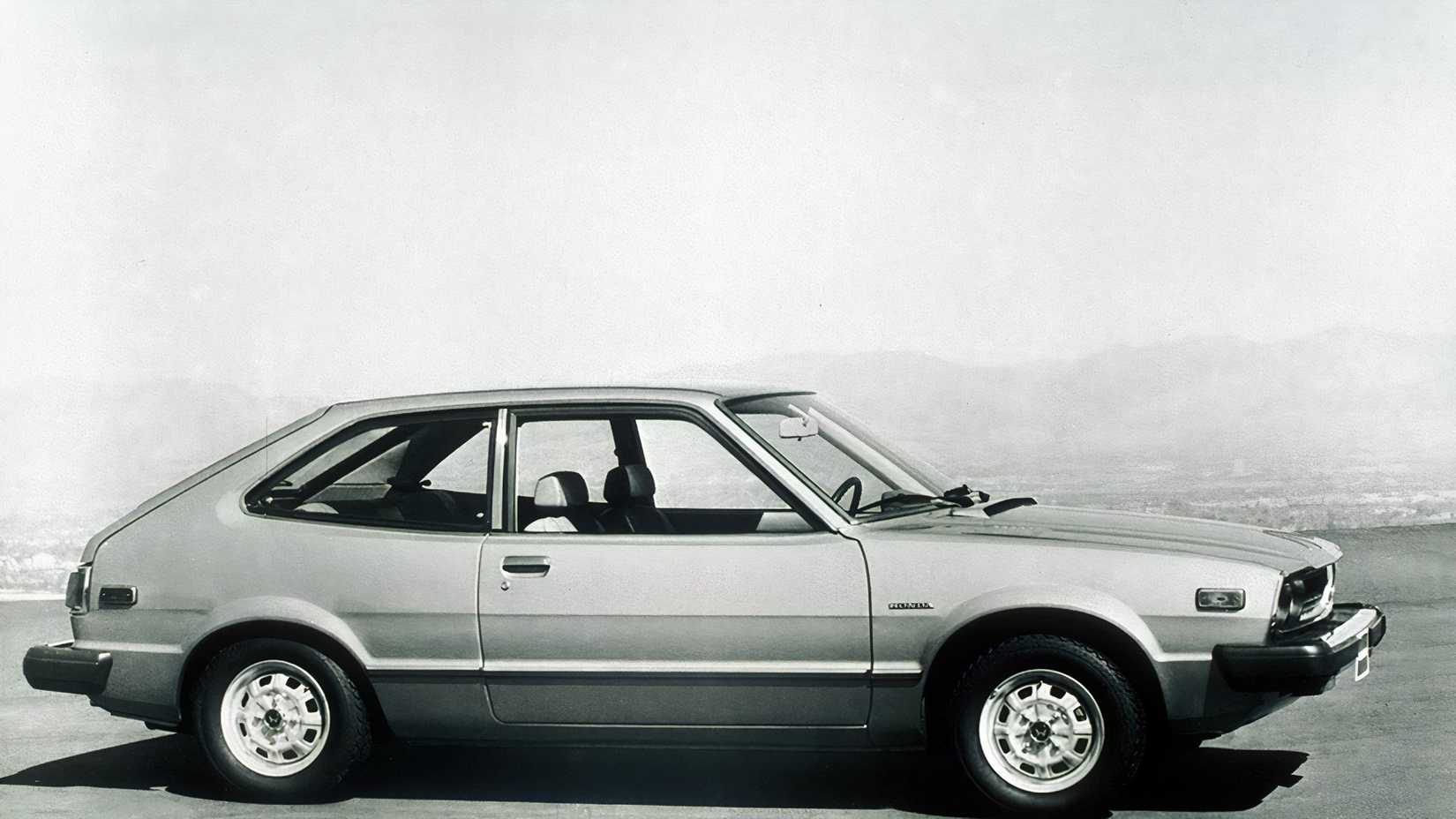 Side shot of a 1976 Honda Accord black and white photo