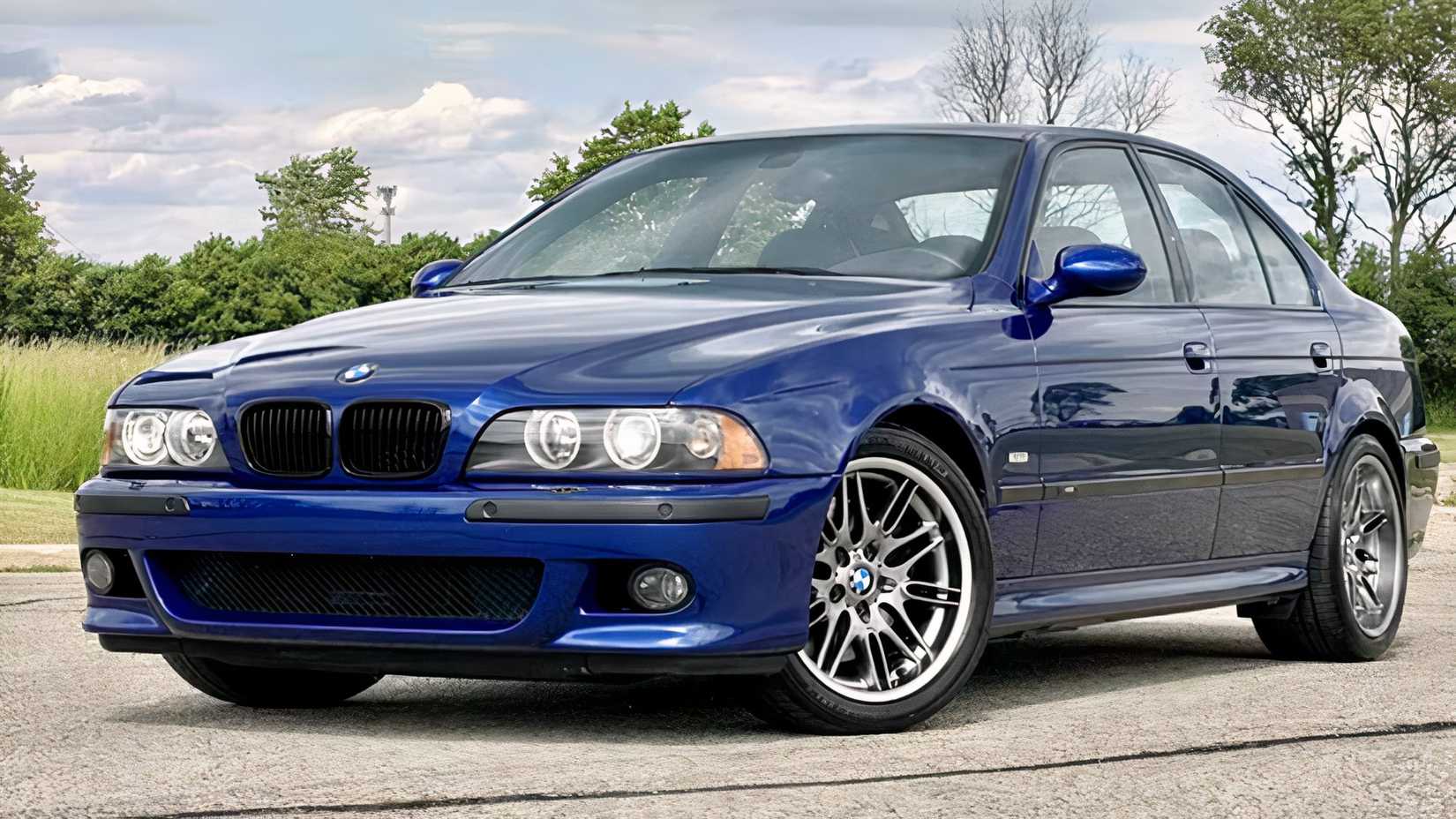 Front 3.4 shot of a 2002 BMW M5 parked in lot