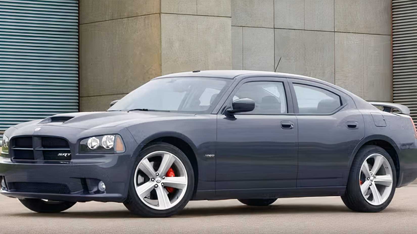 Side shot of a 2010 Dodge Charger SRT8 parked in front of building