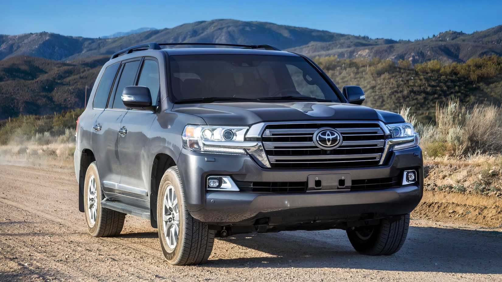 2021 Toyota Land Cruiser Front 3/4 shot parked on a dirt road