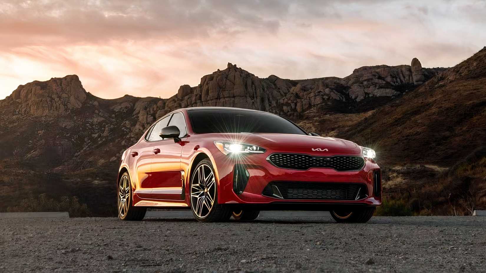 2022 Kia Stinger Front 3/4 parked on a dirt road