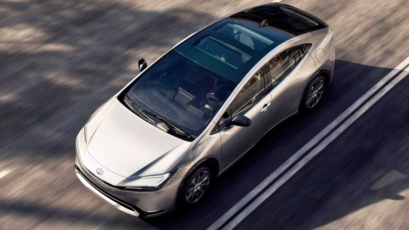 Overhead shot of a 2023 Toyota Prius driving down the road