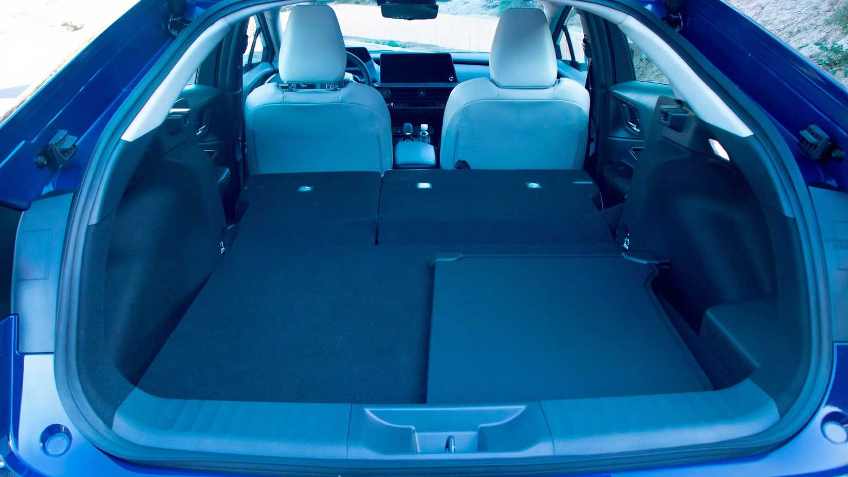 Interior shot of the 2023 Toyota Prius cargo hold seats down