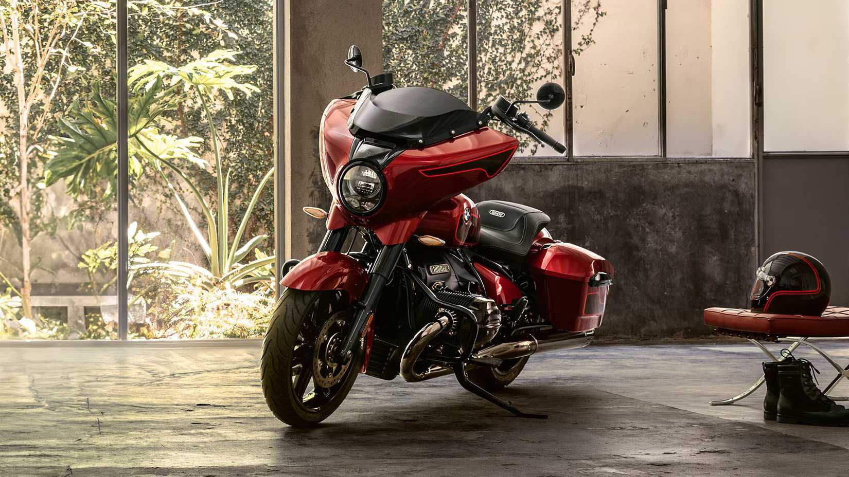 Front three-quarter view shot of 2025 red BMW R 18 B parked indoors. 