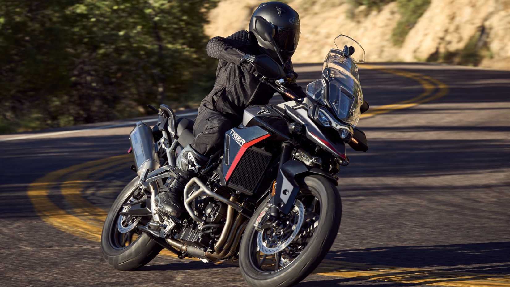 2025 Triumph Tiger 900 GT Pro Taking A Corner In The Twisties