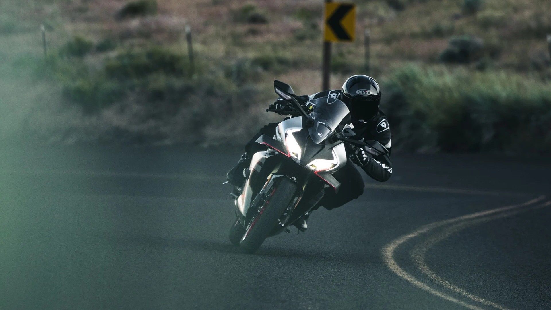 2026 CFMoto 450SS Taking A Left Corner in the canyons