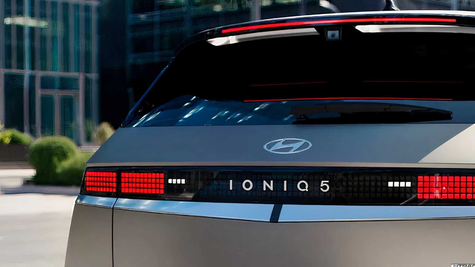 A rear 3/4 shot of a 2026 Hyundai Ioniq 5 showing badge