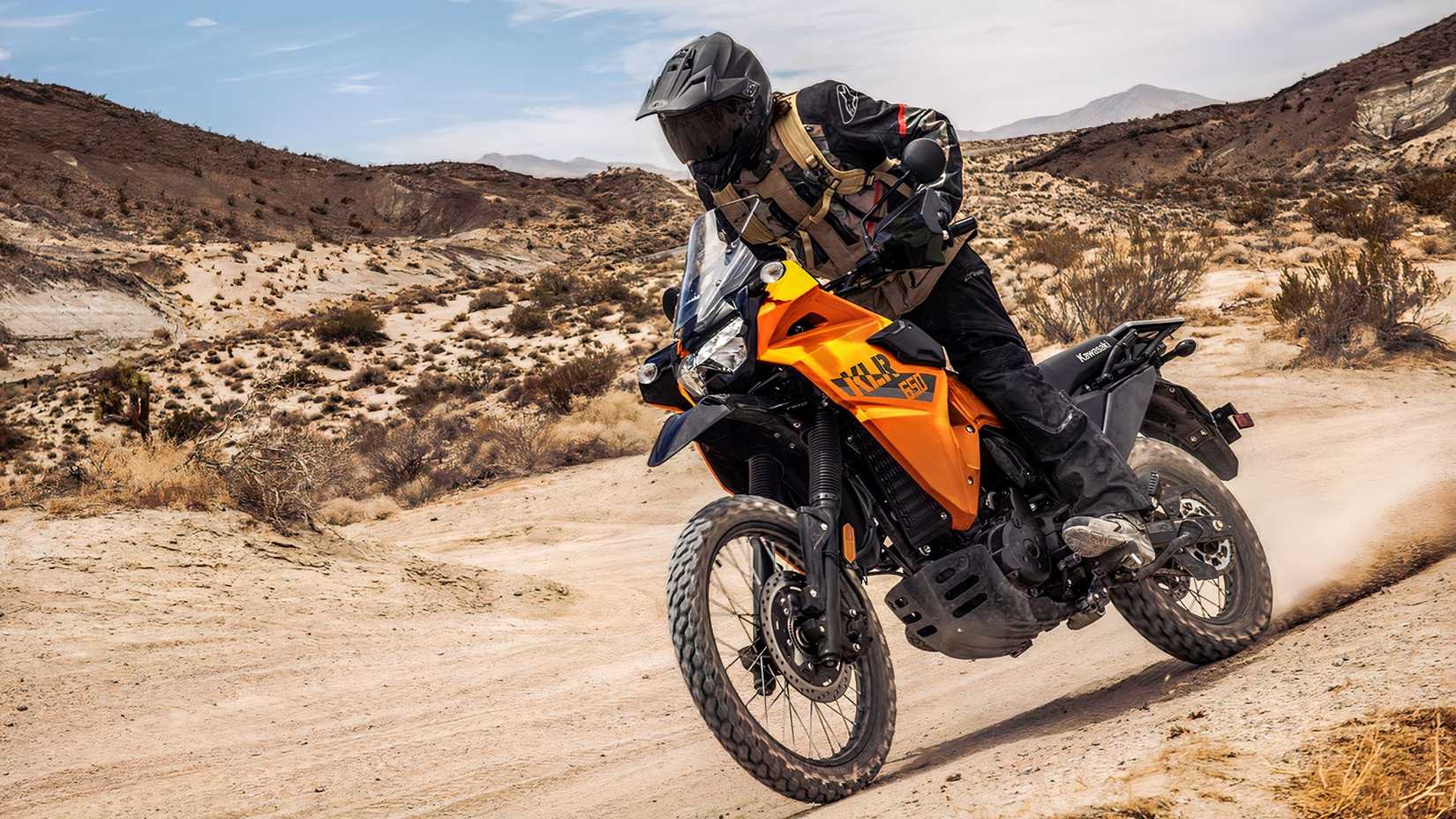 Front quarter view Kawasaki KLR 650 on dirt trail