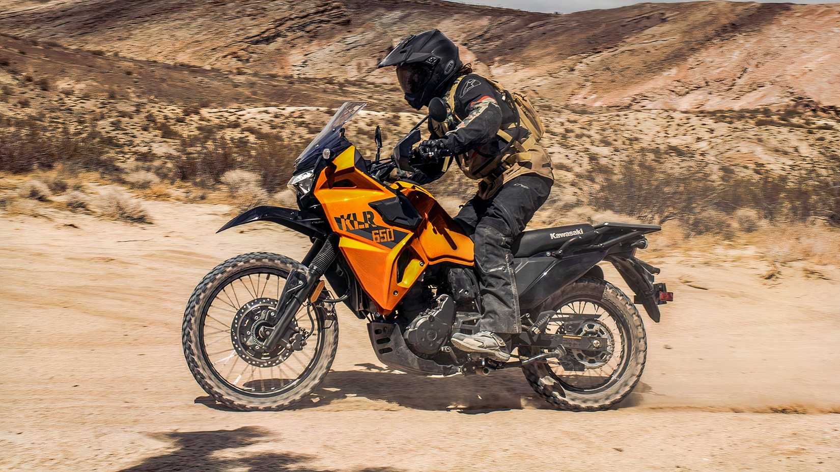 Side view of Kawasaki KLR 650 on dirt trail