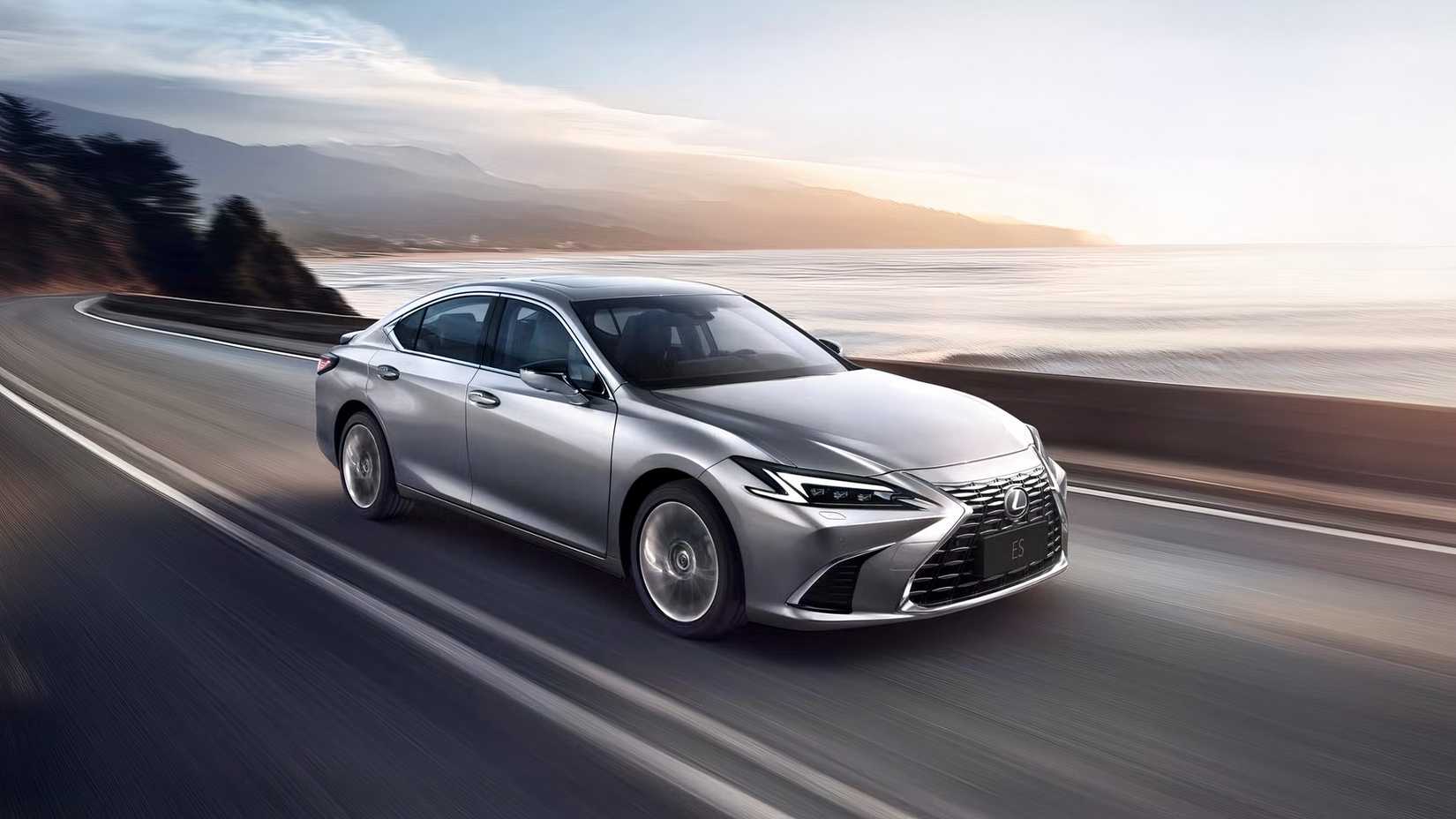 Front 3/4 View Of A 2026 Lexus ES 300h Driving On A Highway