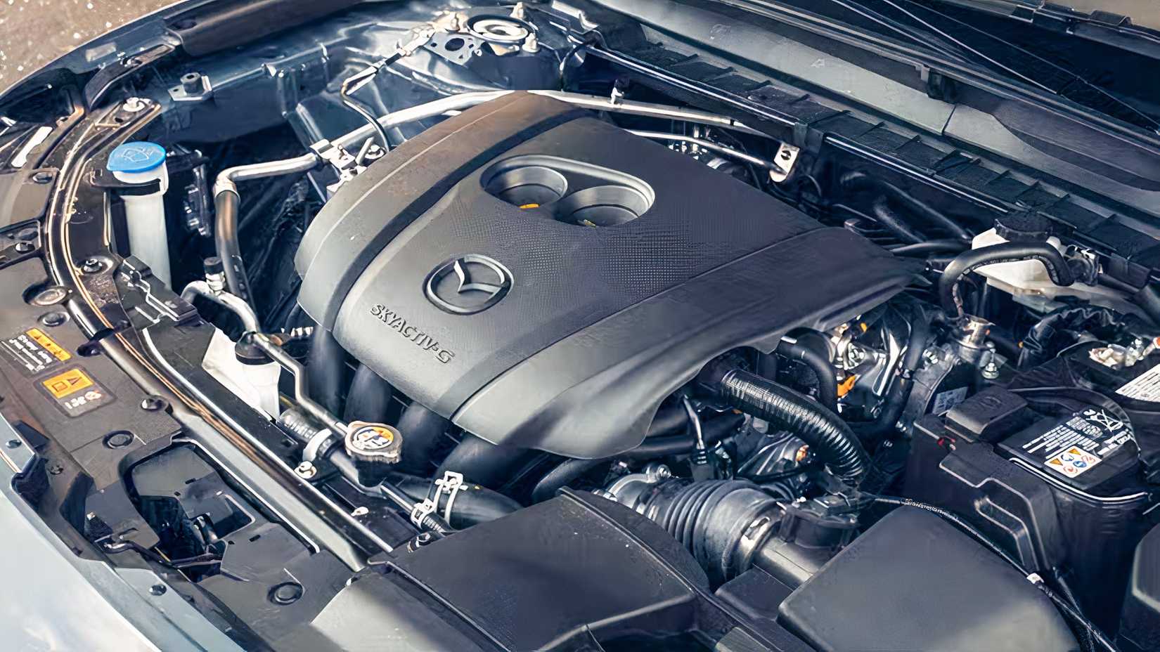 Overhead shot of a 2026 Mazda CX-50's engine